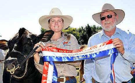 Winning form: Urdiamond Stud owner Julie Gould, of Cinnabar, and Murgon vet Chris Braithwaite with Grand Champion Female Gelbvieh Sherry at the Gympie Show yesterday. Winning form: Urdiamond Stud owner Julie Gould, of Cinnabar, and Murgon vet Chris Braithwaite with Grand Champion Female Gelbvieh Sherry at the Gympie Show yesterday.